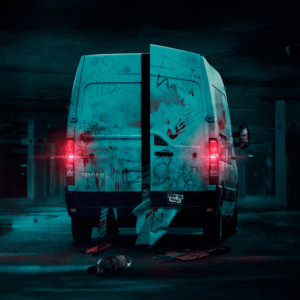 a white trans-it van in a disused car park.